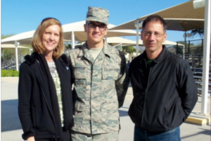 Matt Giangrosso and his parents, when he was 20.
