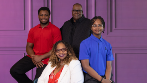 Titus with his parents and brother.